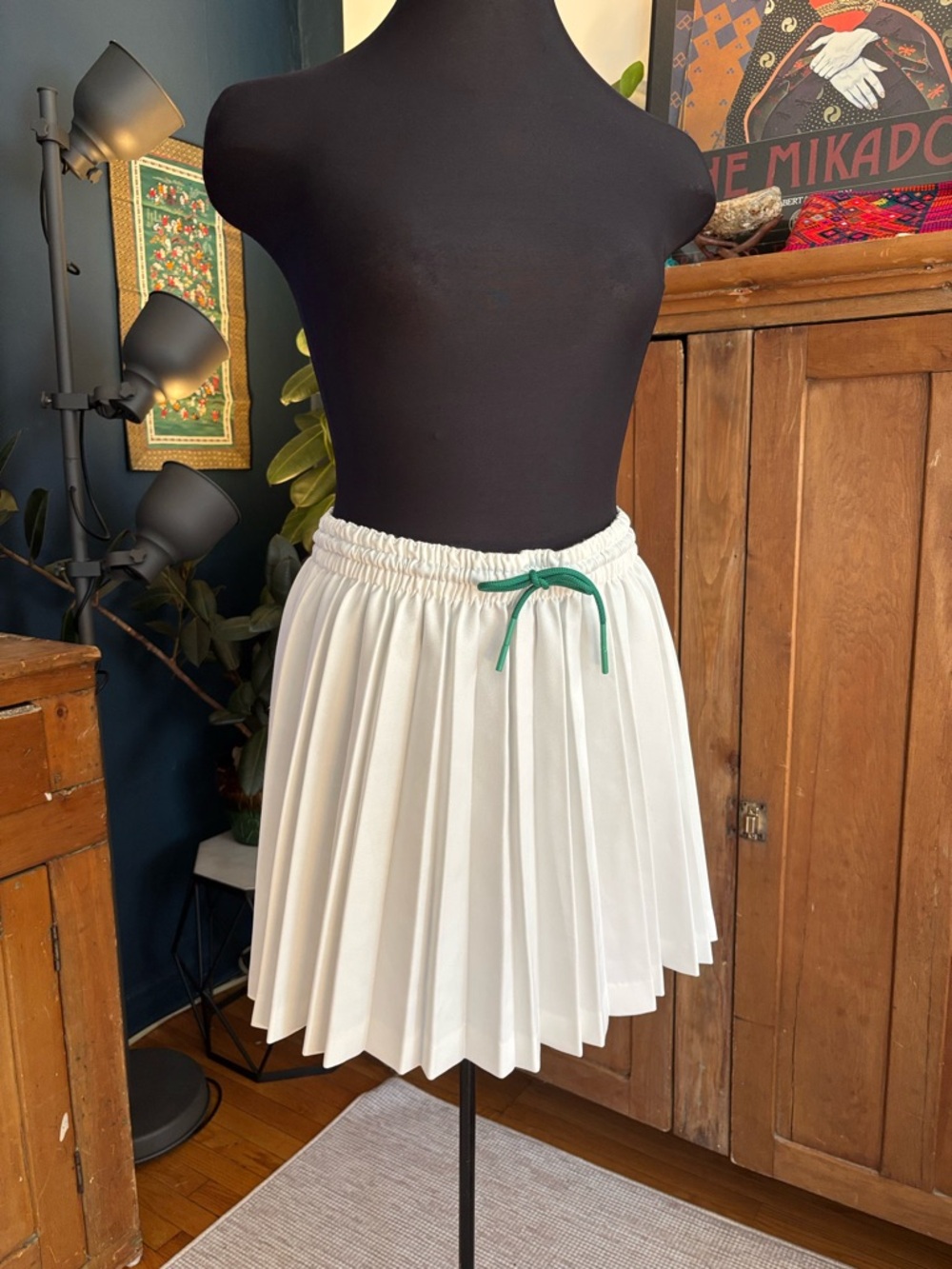 Lacoste White Pleated Mini Skirt with Green Drawstring